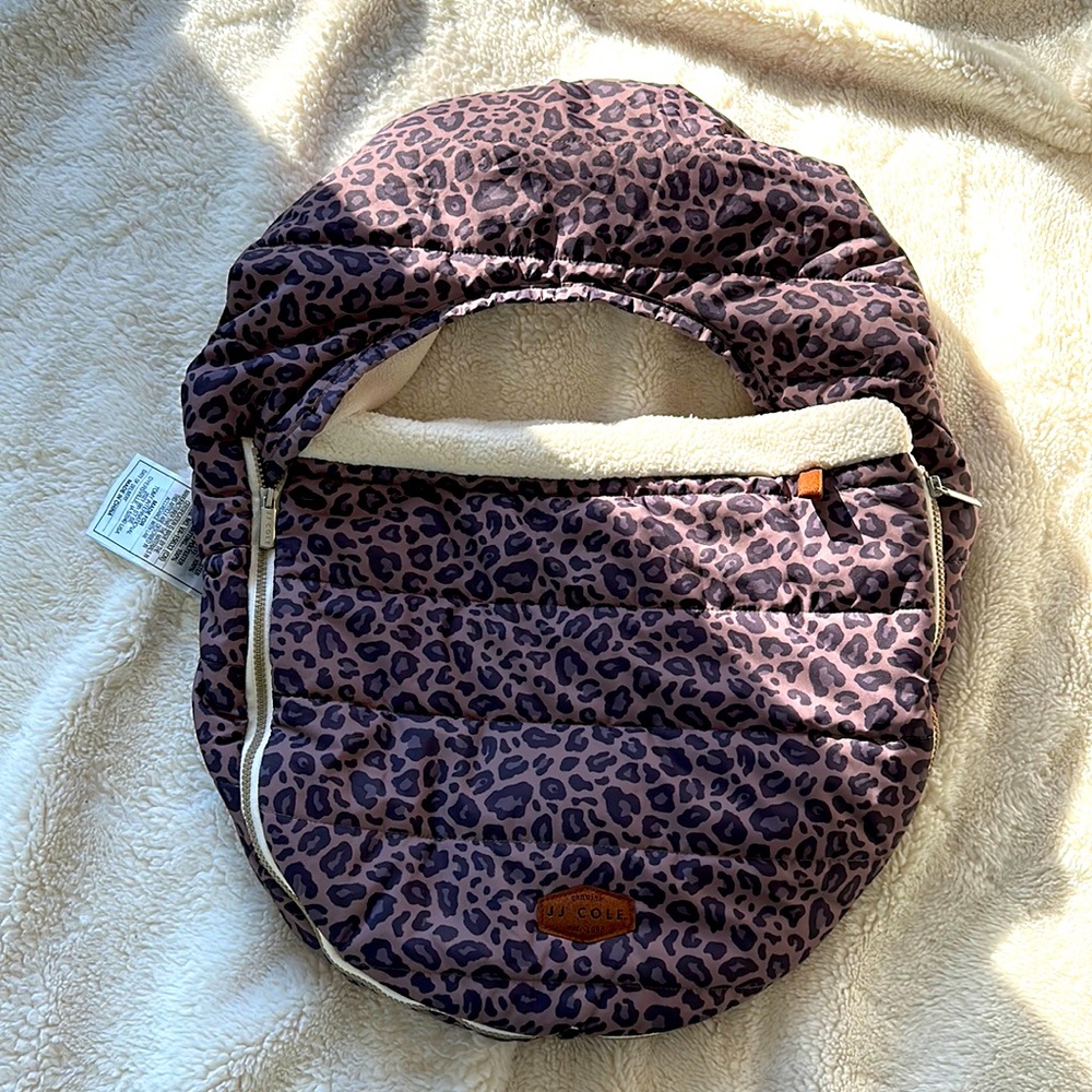 Brand new JJ Cole car seat cover.